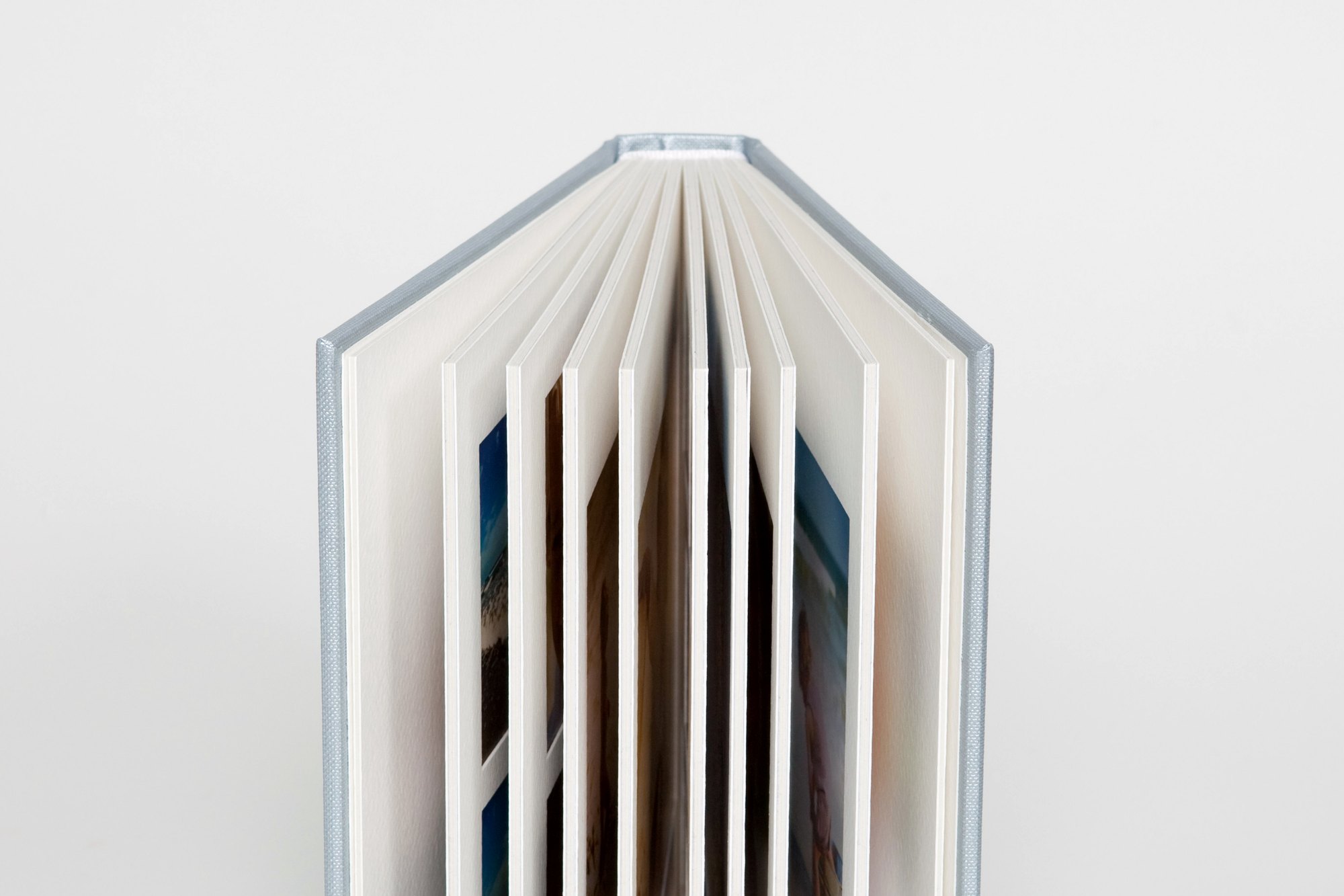 Thick lay-flat matted pages of a Queensberry album