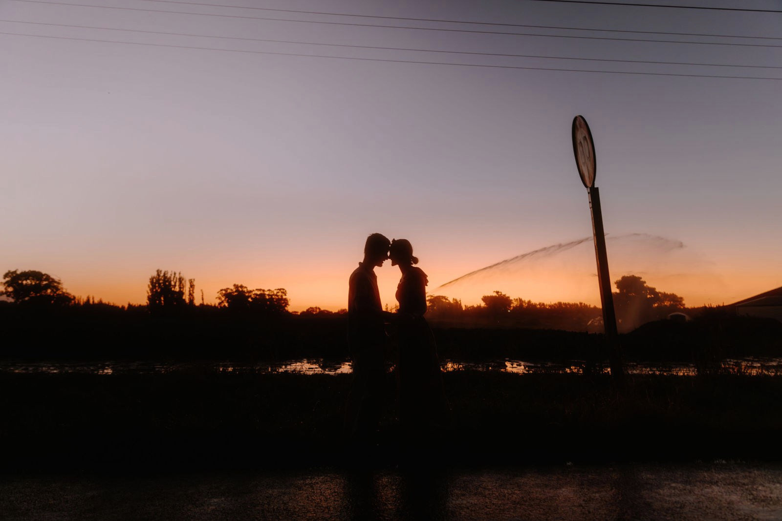 Engagement session silhouette at sunset