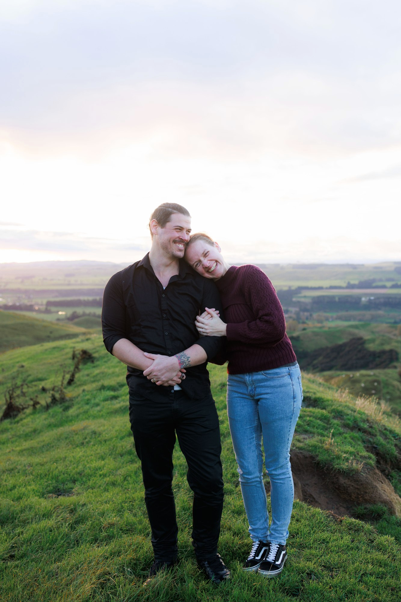 Couple embracing in the hills