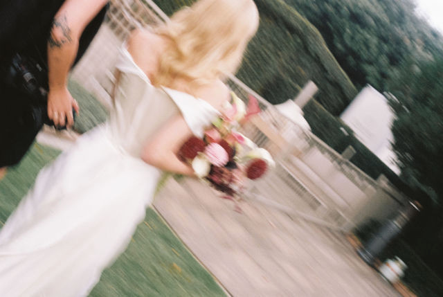 35mm film photograph, bride in motion
