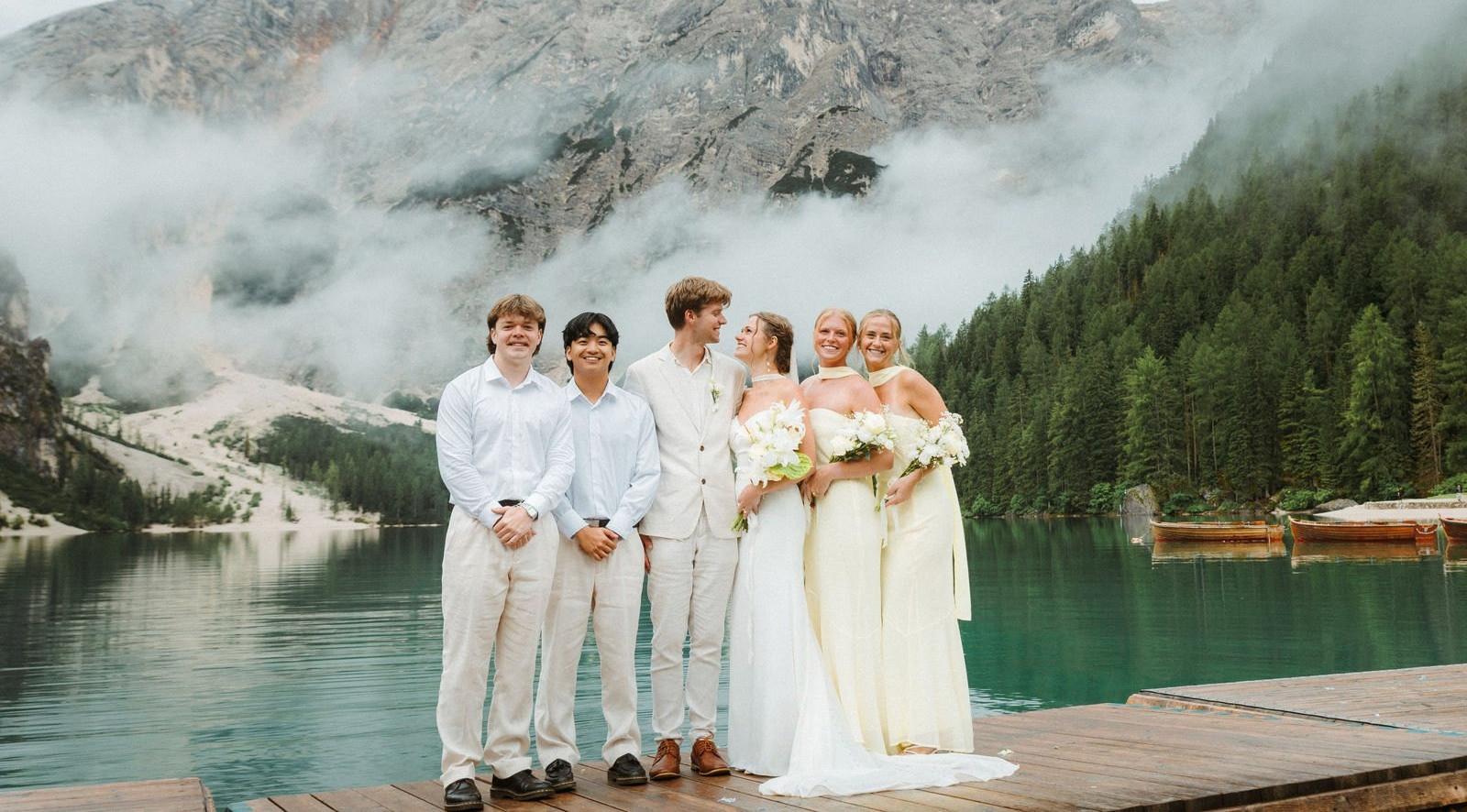Elopement group by the alpine lake