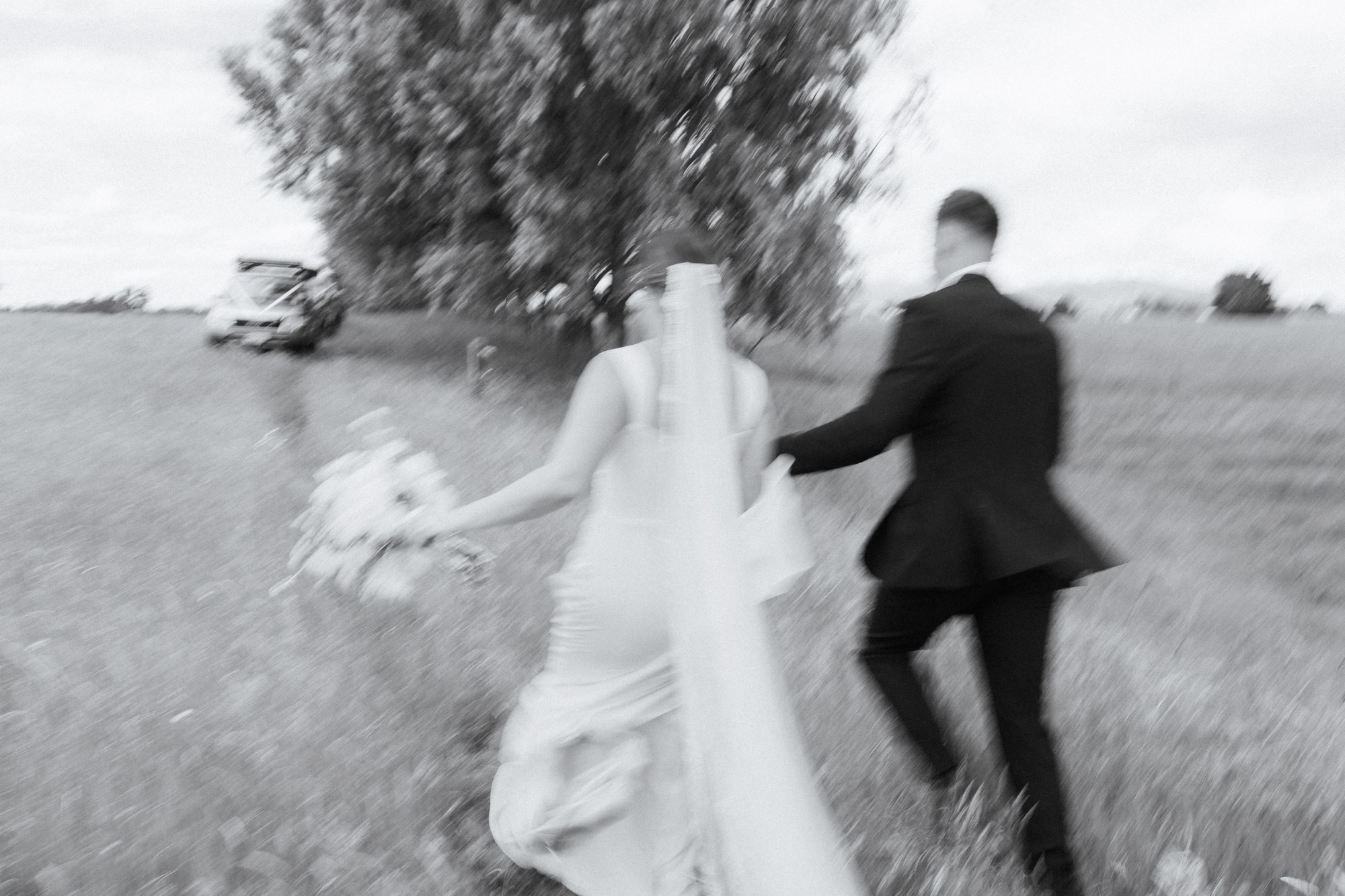 Couple in a field, black and white